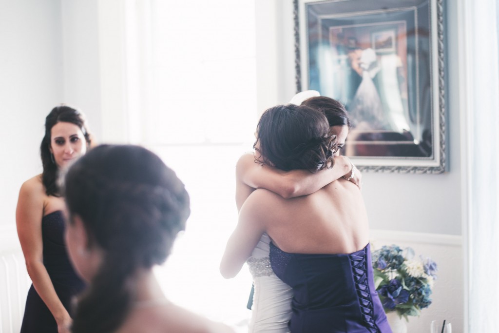 Hugs before ceremony  with Tom Studios Wedding Photography