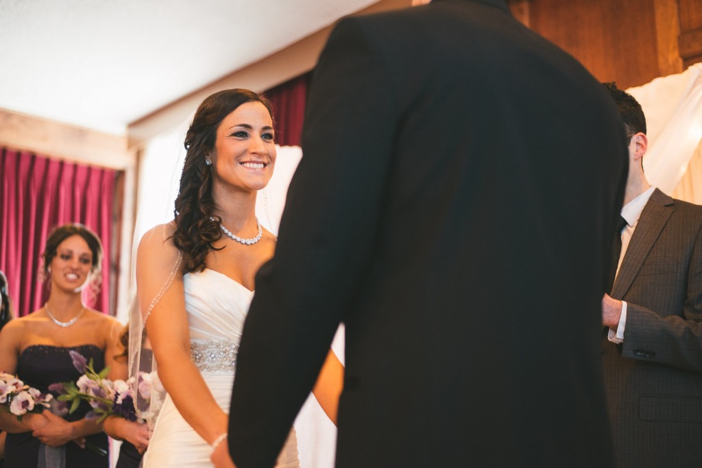 Bride and Groom at ceremony  with Tom Studios Wedding Photography 