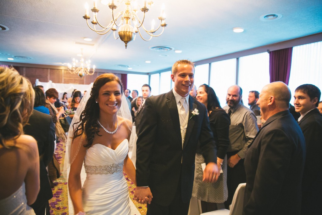 Bride and Groom at ceremony  with Tom Studios Wedding Photography 