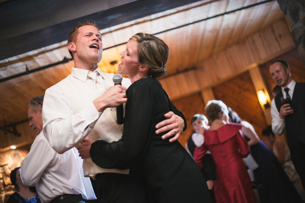 Groom and Sister singing at Dibbles Inn with Tom Studios Wedding Photography