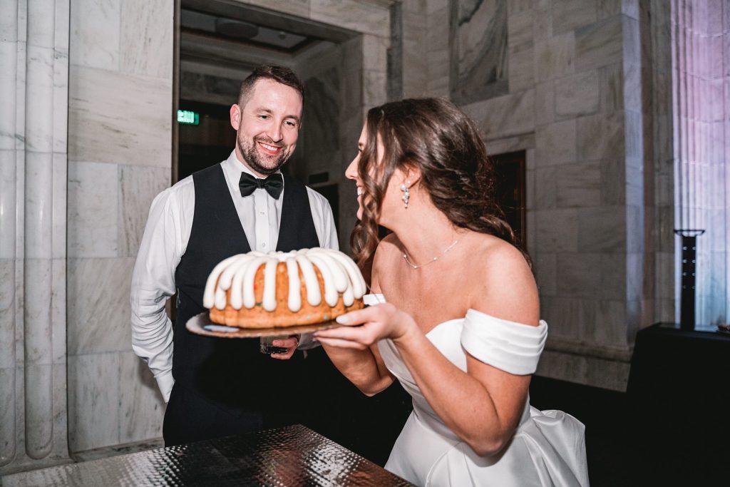 Bride and Groom Cake Cutting at Sixty State Place wedding