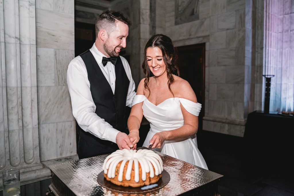 Bride and Groom Cake Cutting at Sixty State Place wedding