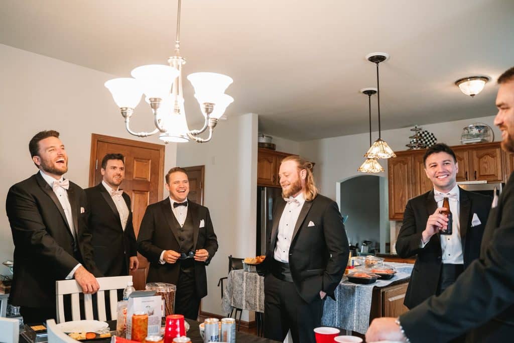 groom getting ready with groomsmen