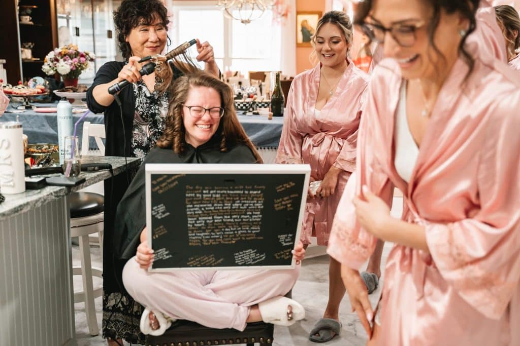 bride getting ready with bridesmaids