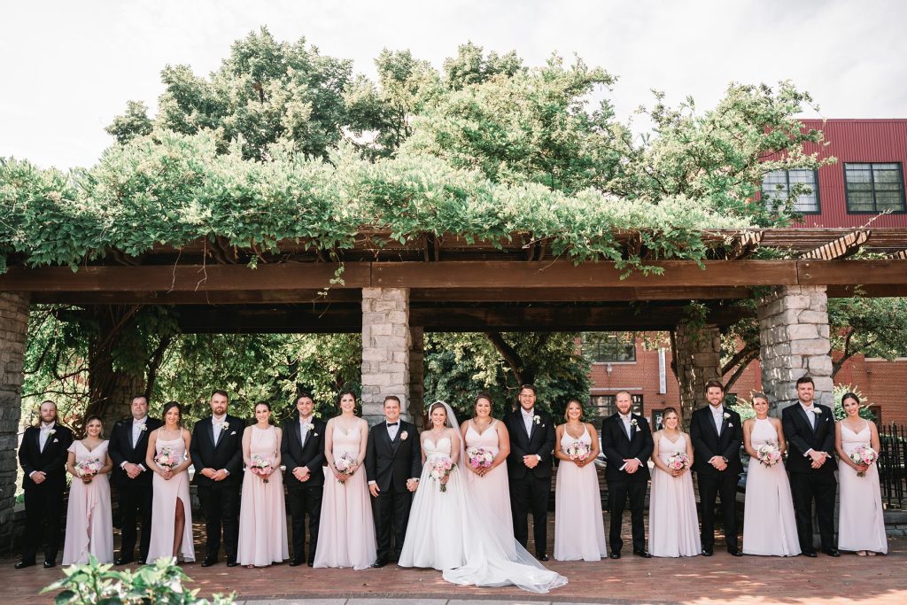 sky armory wedding portraits with bridesmaids and groomsmen