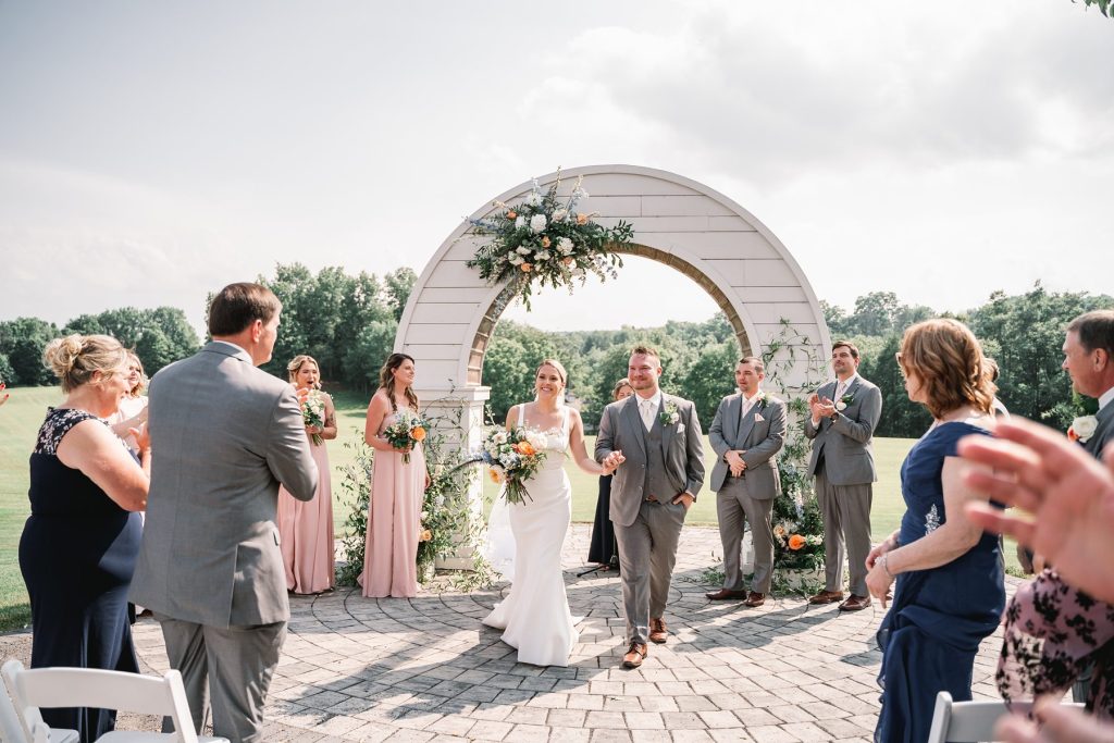 spring hayloft on the arch wedding ceremony first kiss