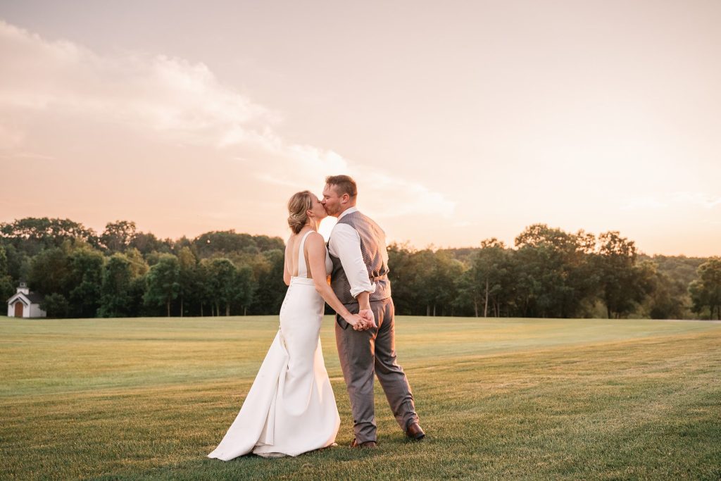 spring hayloft on the arch wedding sunset