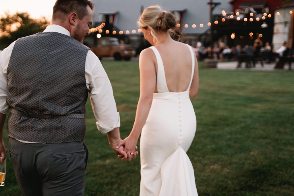 spring hayloft on the arch wedding sunset