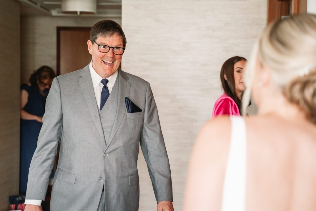 spring hayloft on the arch wedding father first look